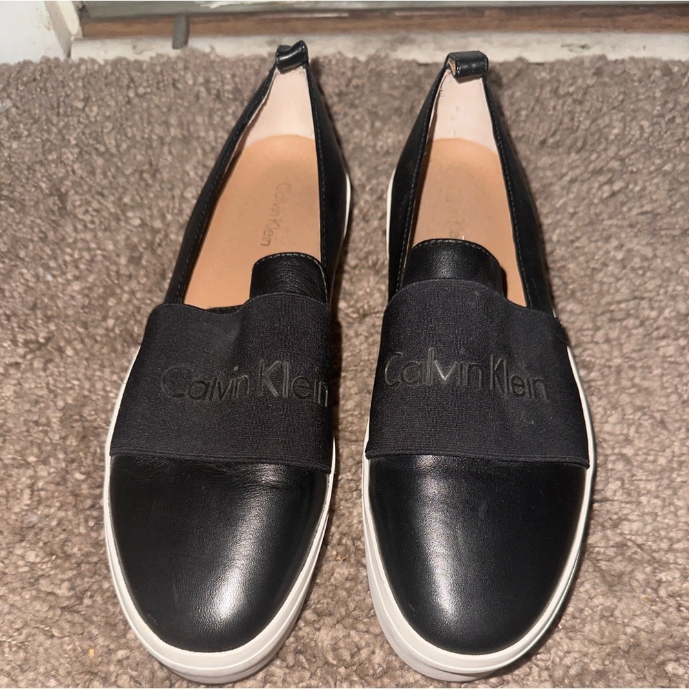 Calvin Klein Black leather platform sneakers. Size 9. Like new.
